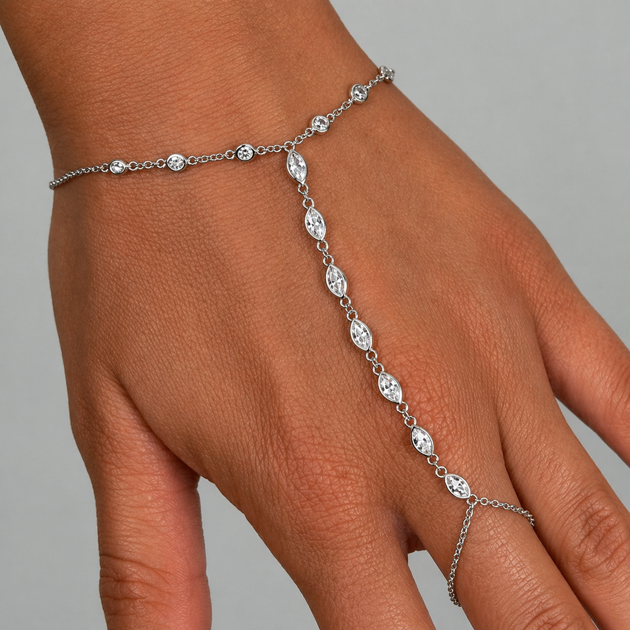 Gold hand chain bracelet with CZ stones in 18K gold plated sterling silver, dainty bracelet ring design perfect for wedding jewelry, special occasions, and everyday elegance