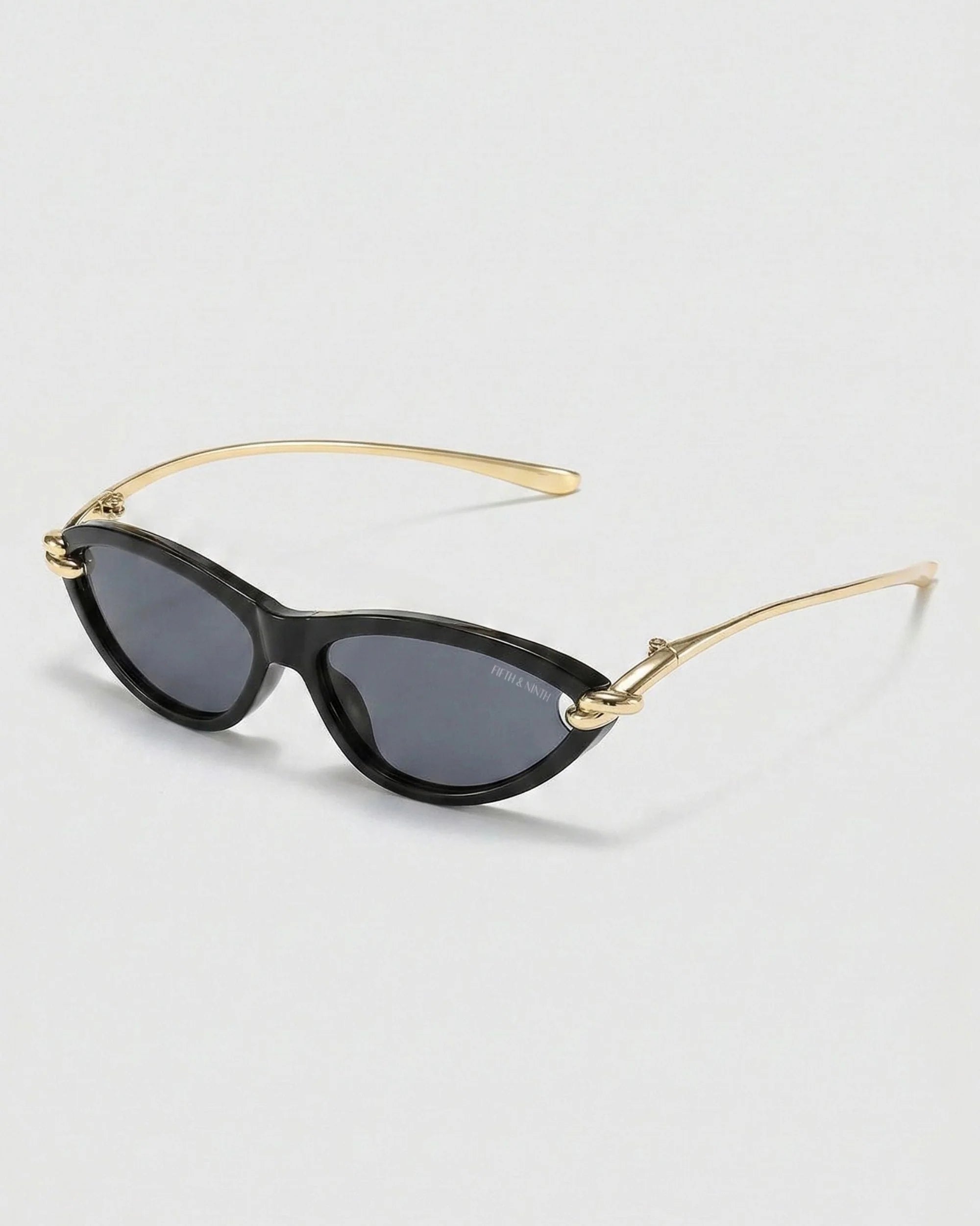 Modern black polarized sunglasses with sleek cat-eye silhouette and 100% UV protection