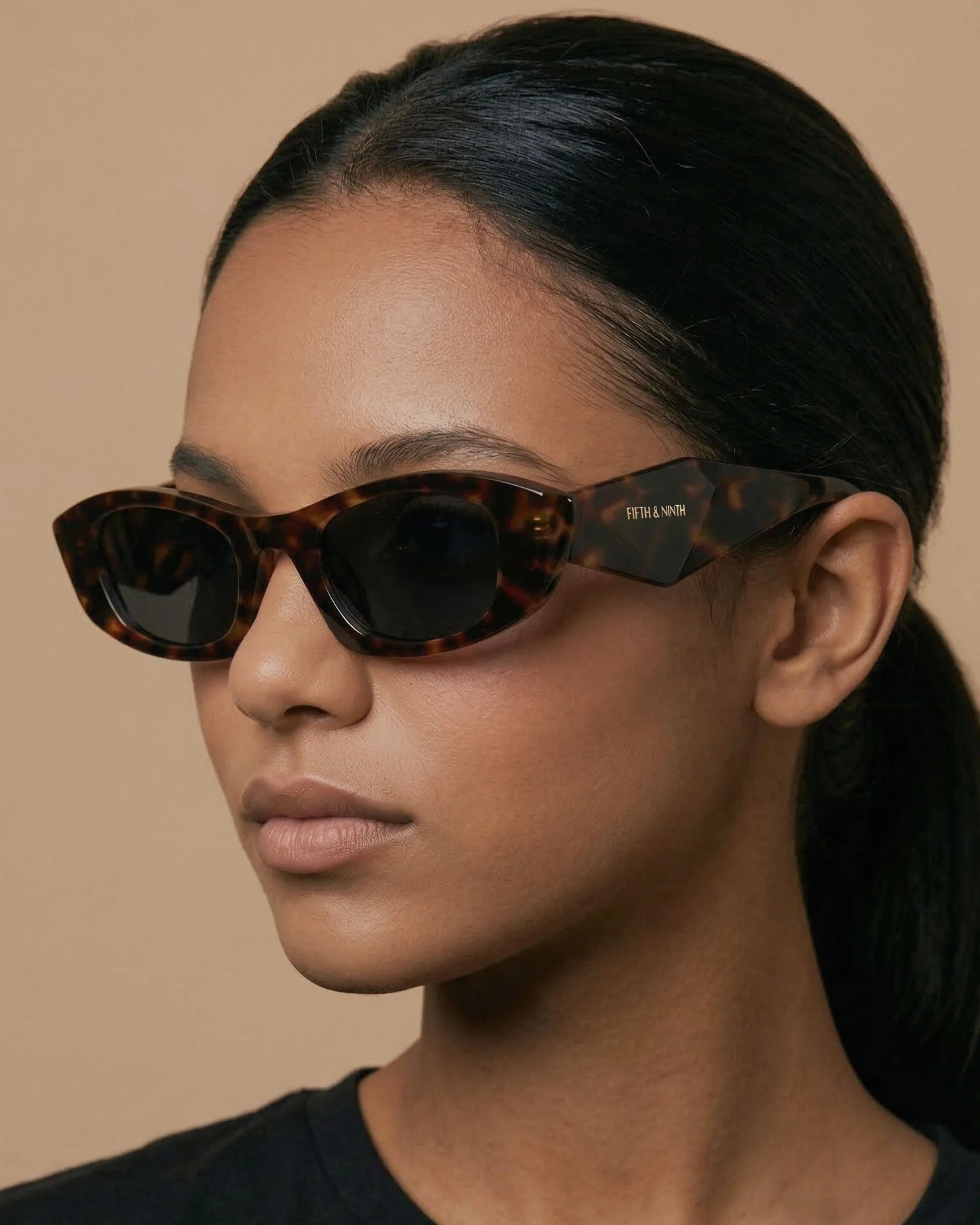 Gia polarized sunglasses in tortoise acetate featuring a slim oval silhouette and UV protection