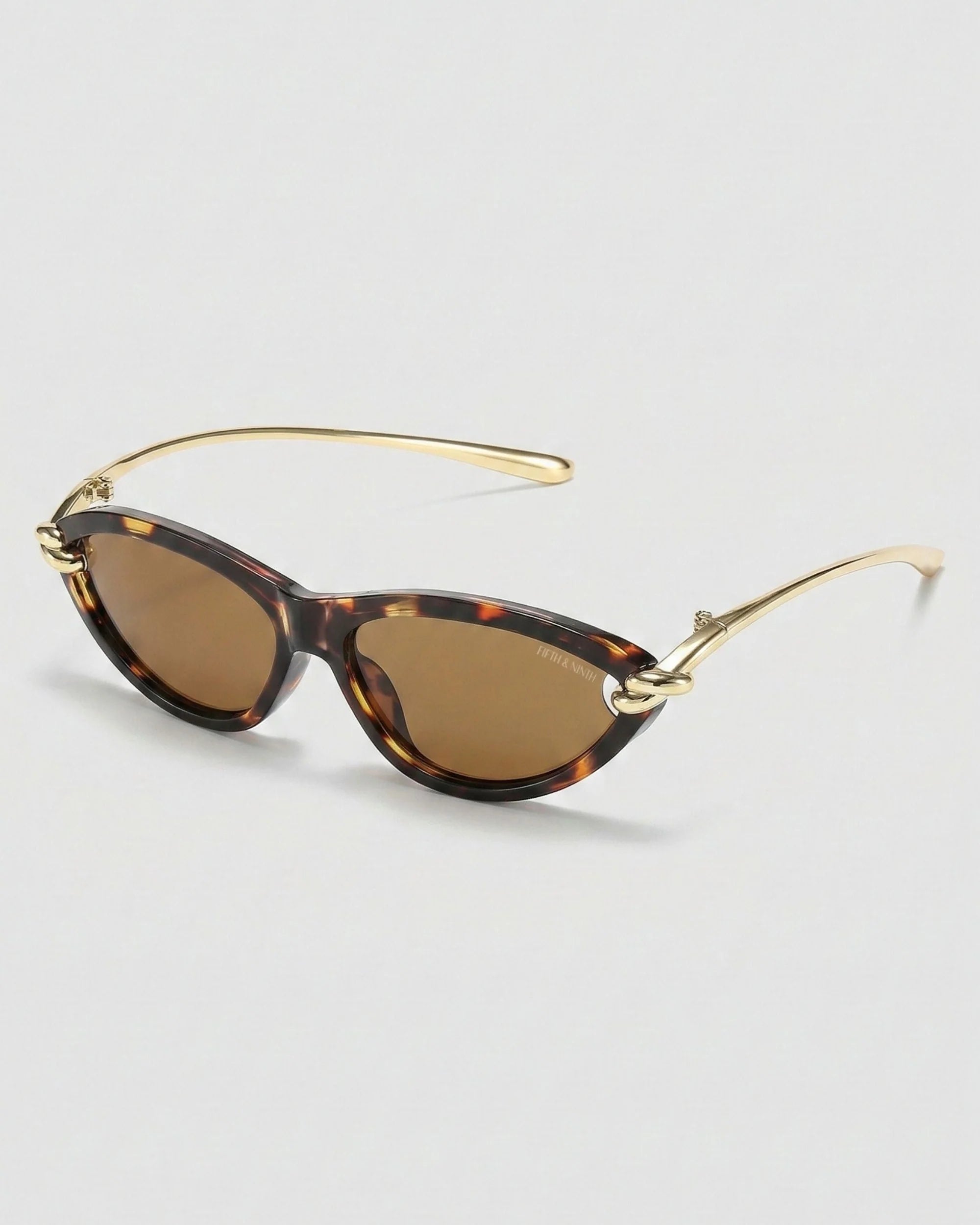 Modern Saskia polarized sunglasses with sleek cat-eye silhouette and 100% UV protection